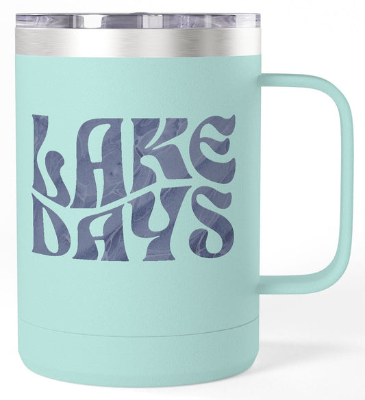 Mint green mug with 'Lake Days' text on a white background